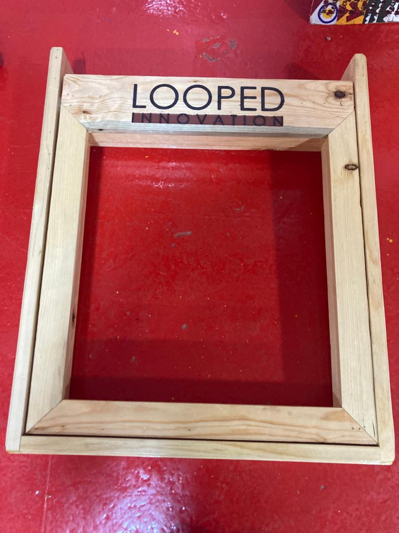 The Looped Innovation branded wooden deckle and mould frame